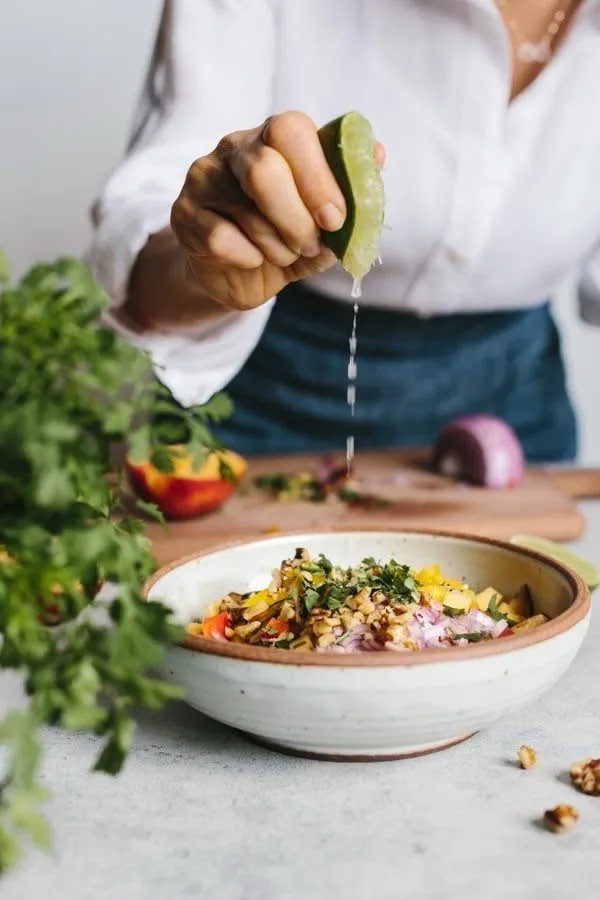 Squeezing fresh lime over a nourishing, balanced dish